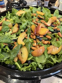 Blueberry peach salad prepared on site