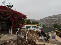 Pool to the left of the property, outside owners residence
