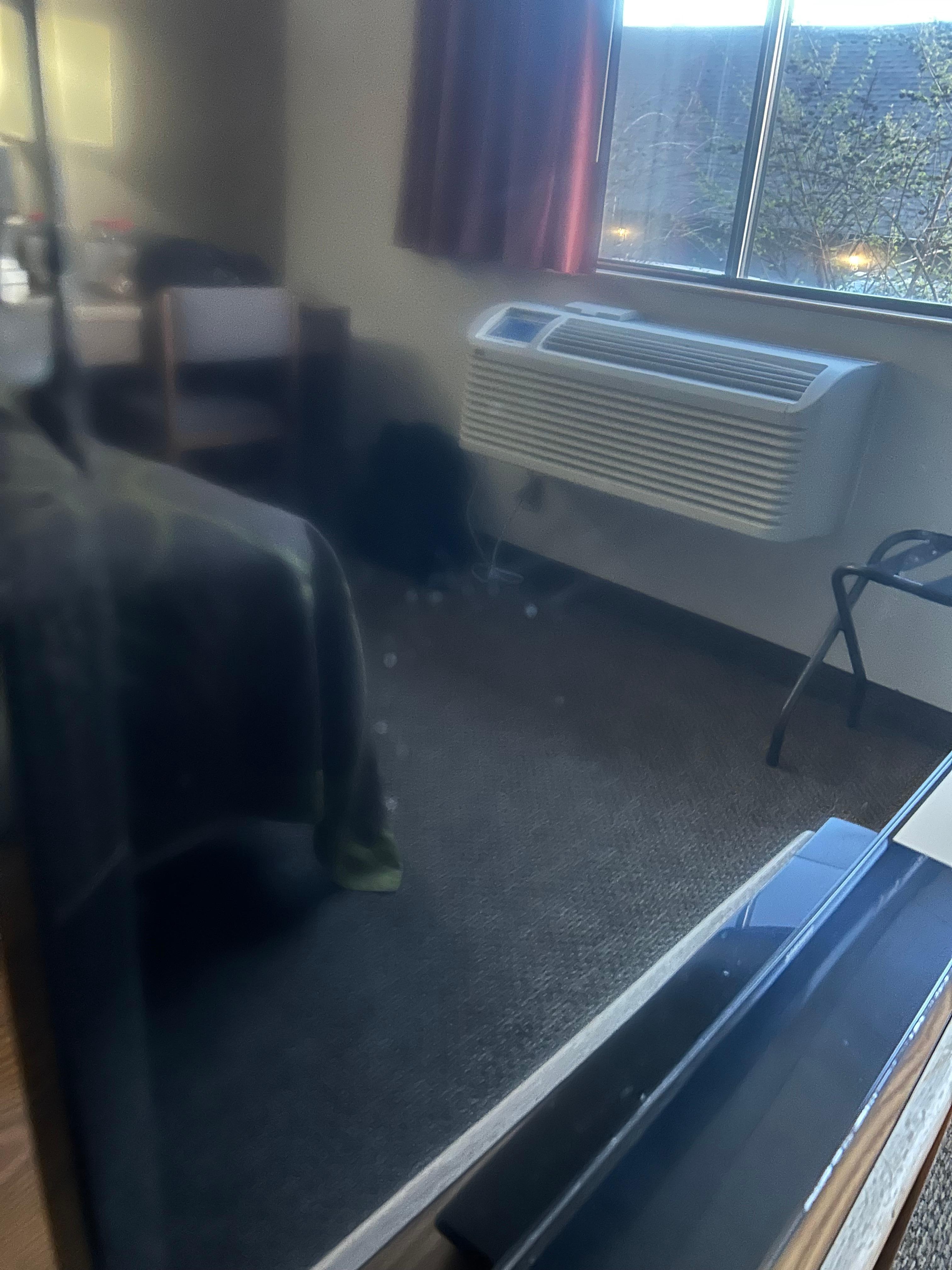 Weird spots all over TV - this is AFTER I used the hotel cleaning solution