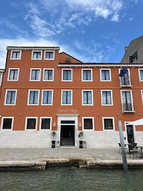 Facade of hotel taken from Canal