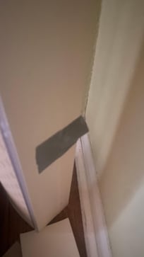 Fell down from the blinds in the first room because they duct taped to the wall