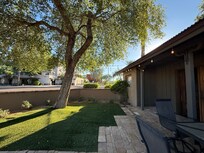 Front yard with shaded porch