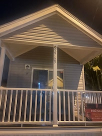 Cottage is cute with porch