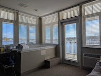 Jacuzzi in the downstairs corner rom