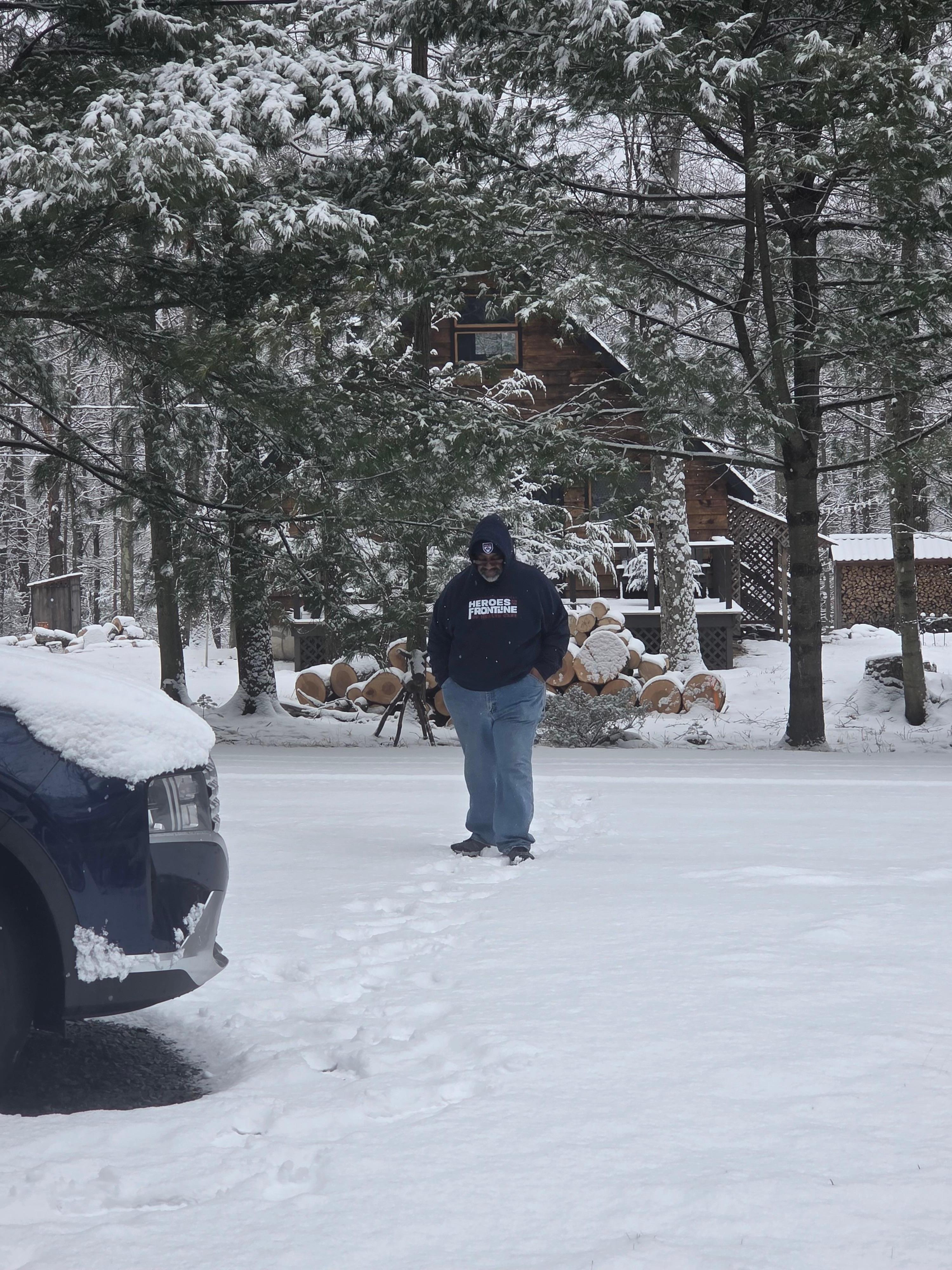 My husband surveying  the snow!