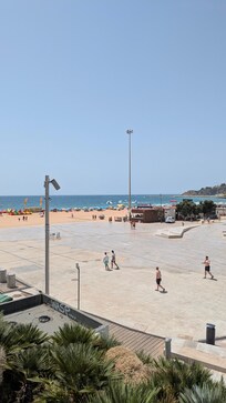 Beach one minute away. A restaurant overlooks the beach nearby.