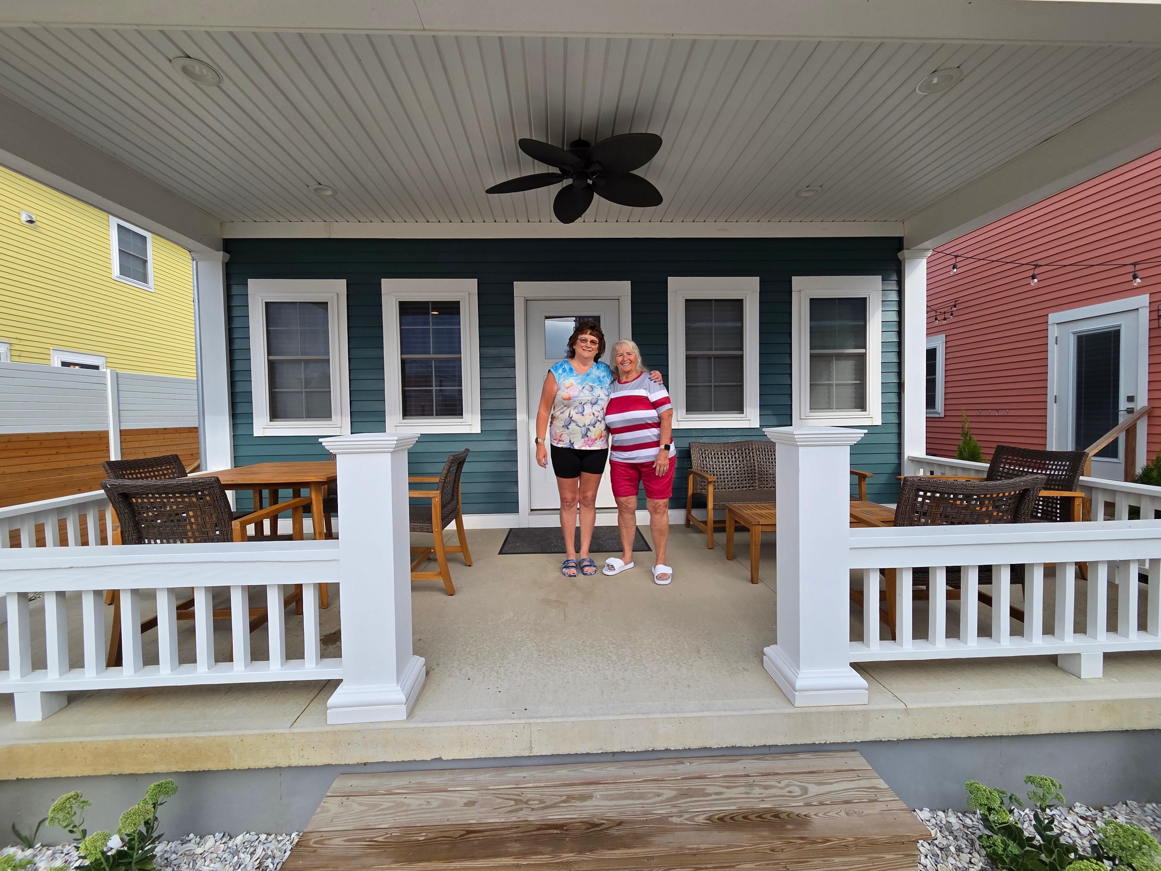 My 2 sisters with Lake house.