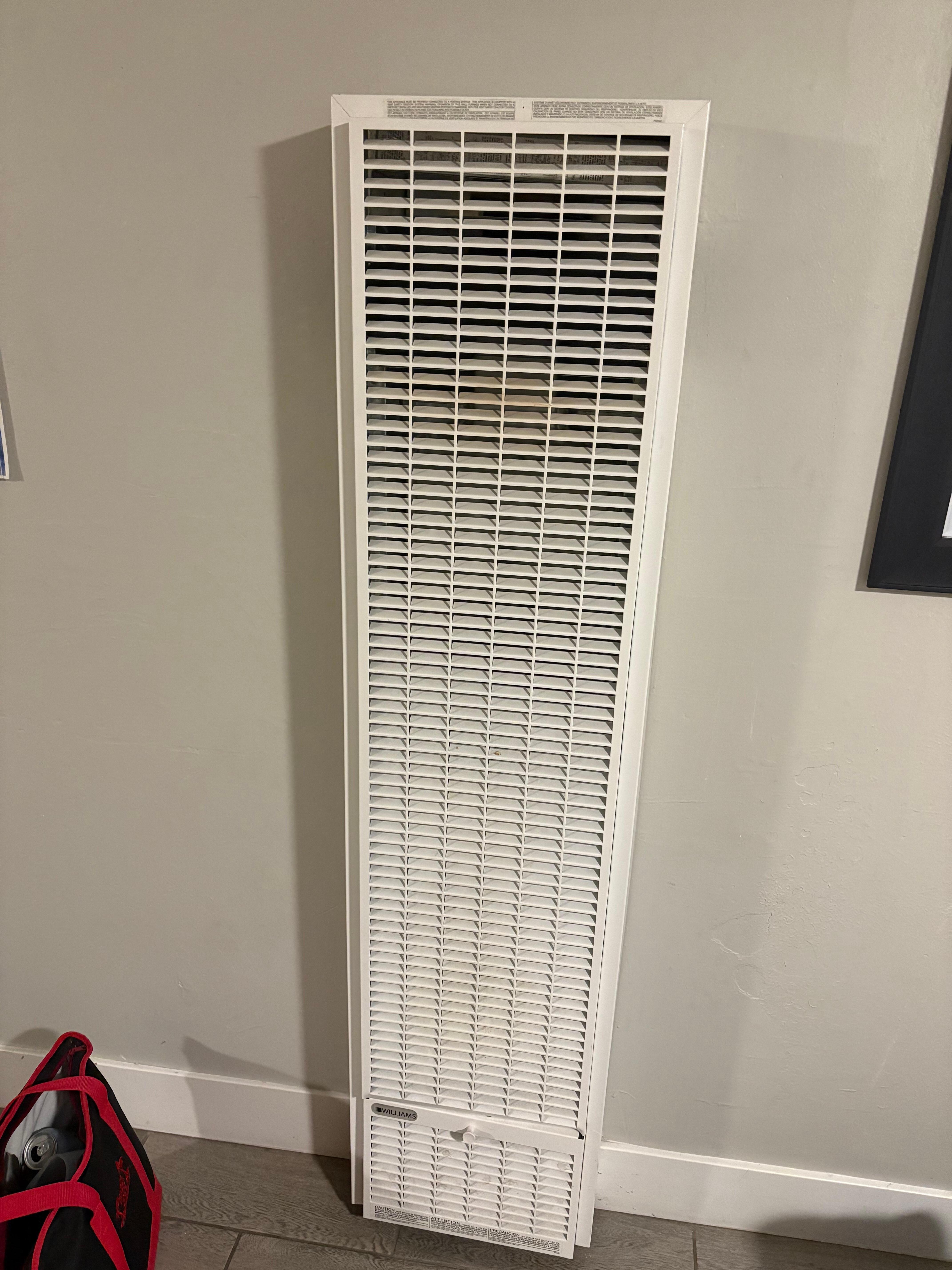 Heat source for apartment located in living room.