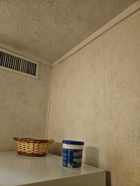 filthy ceiling and water container full of mold, and filthy ducts.