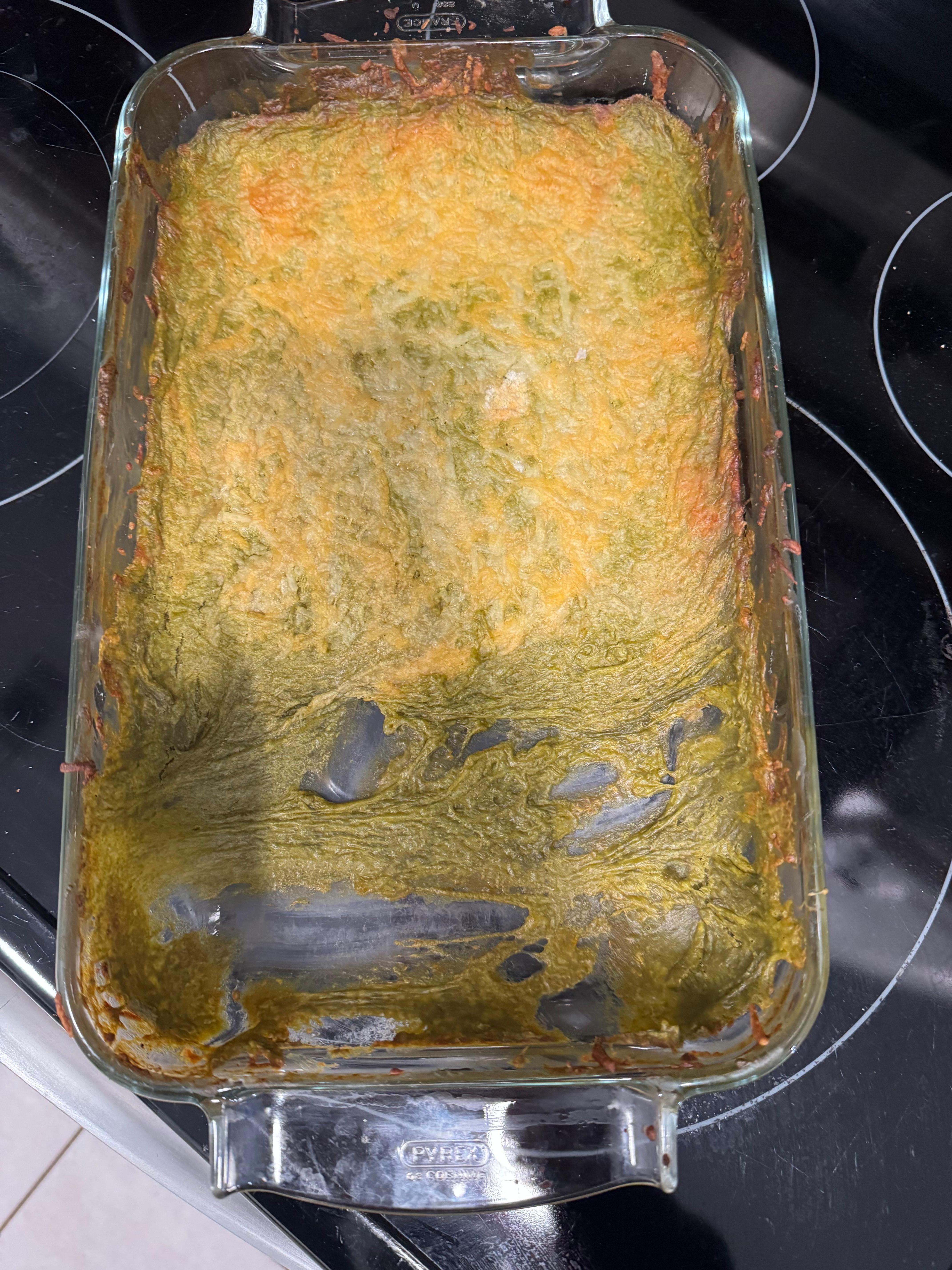 Moldy casserole left in oven by cleaning crew