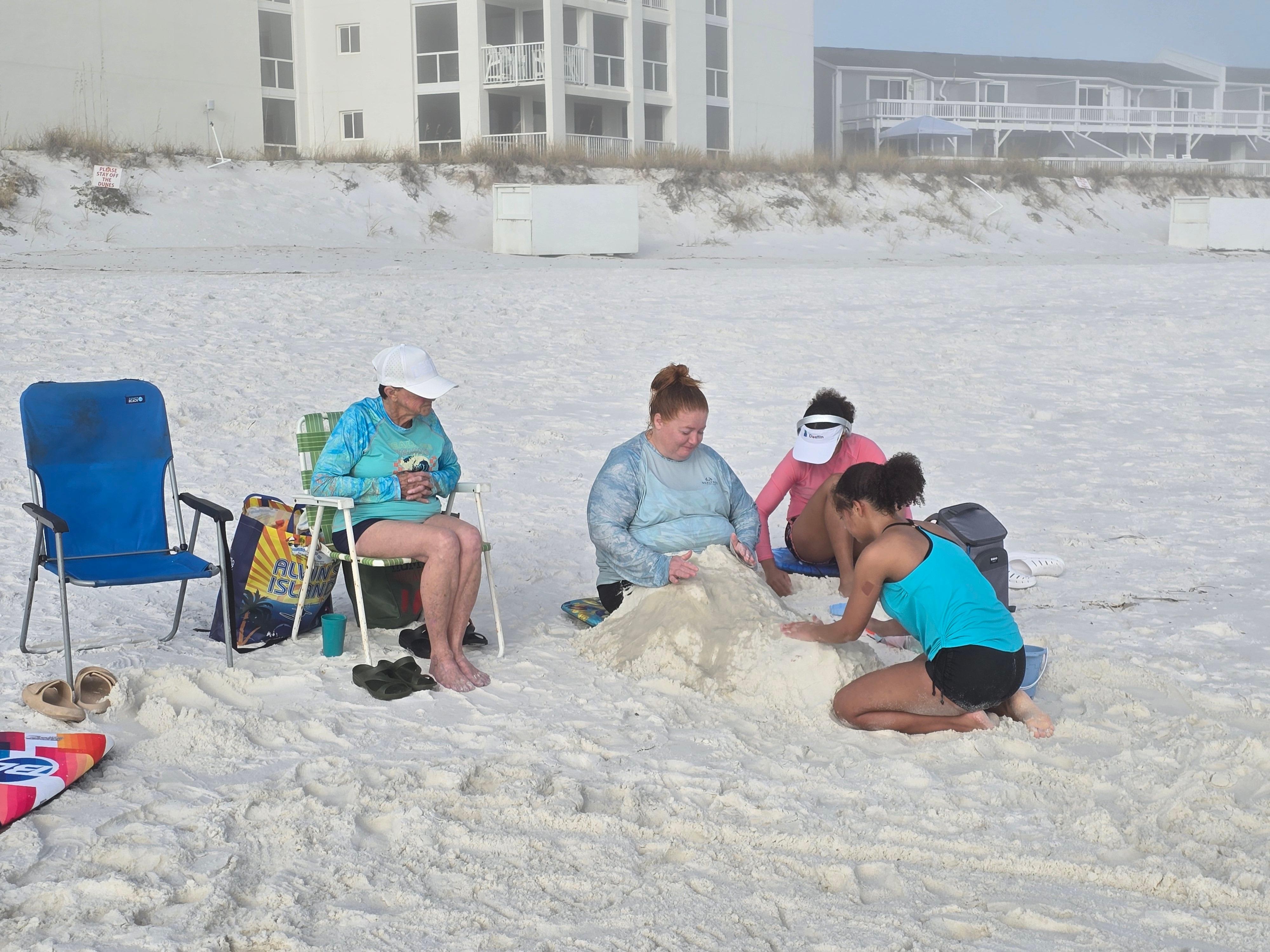 Enjoying our day on the beach, beautiful white sand.