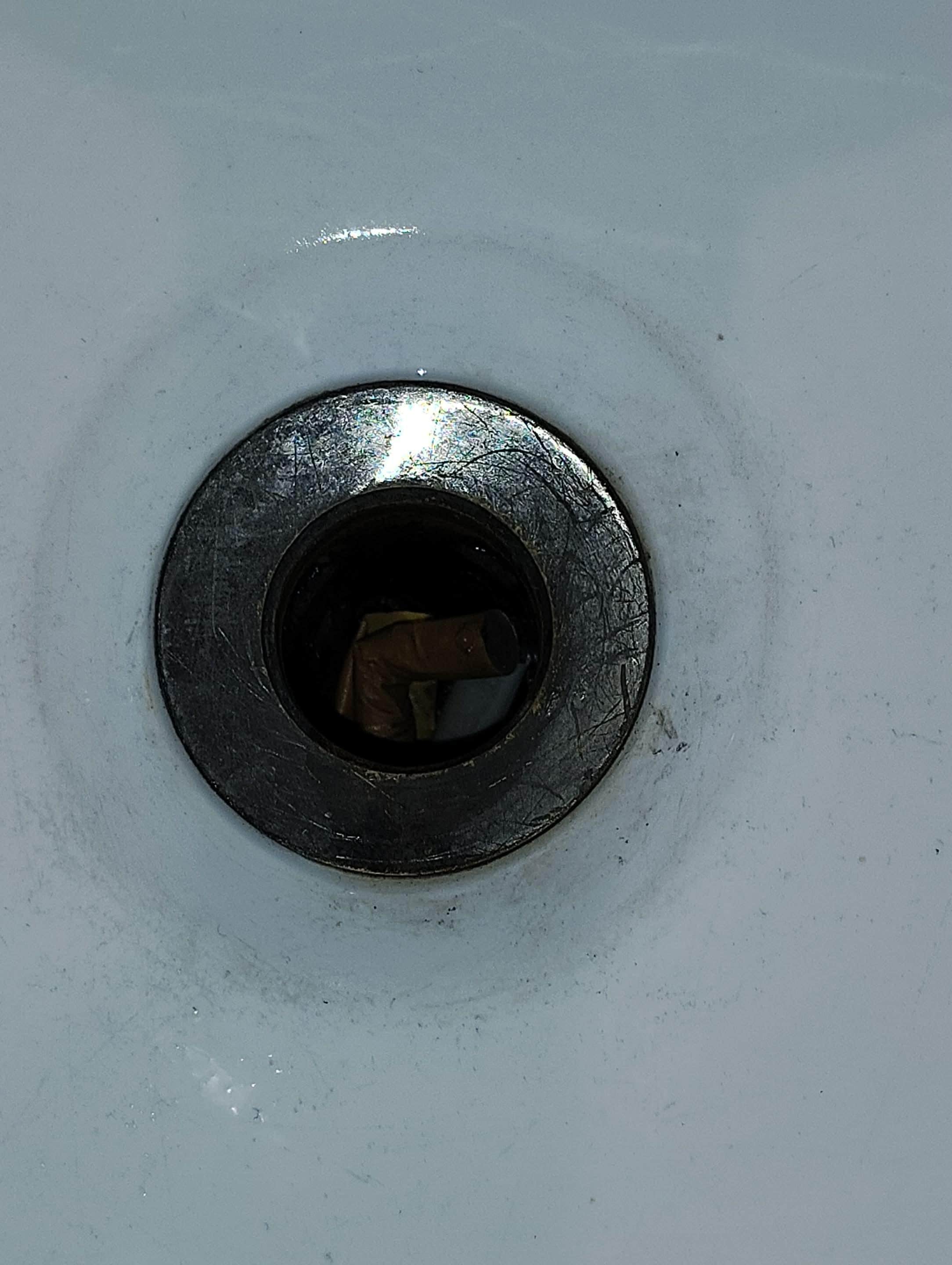 Cigarettes in sink drain