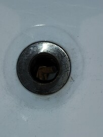 Cigarettes in sink drain