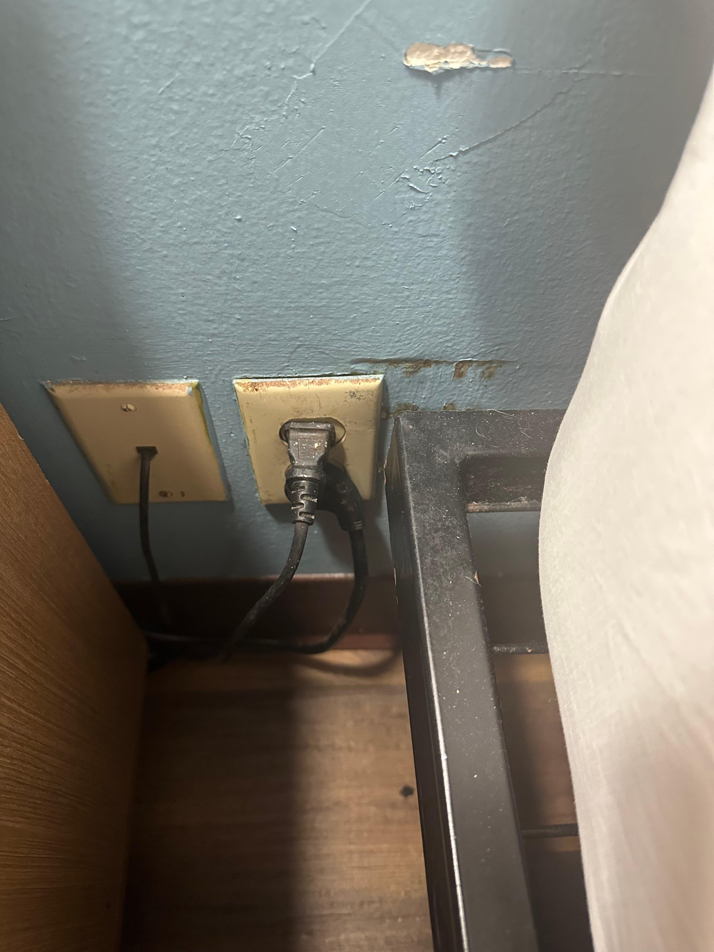 Behind the beds