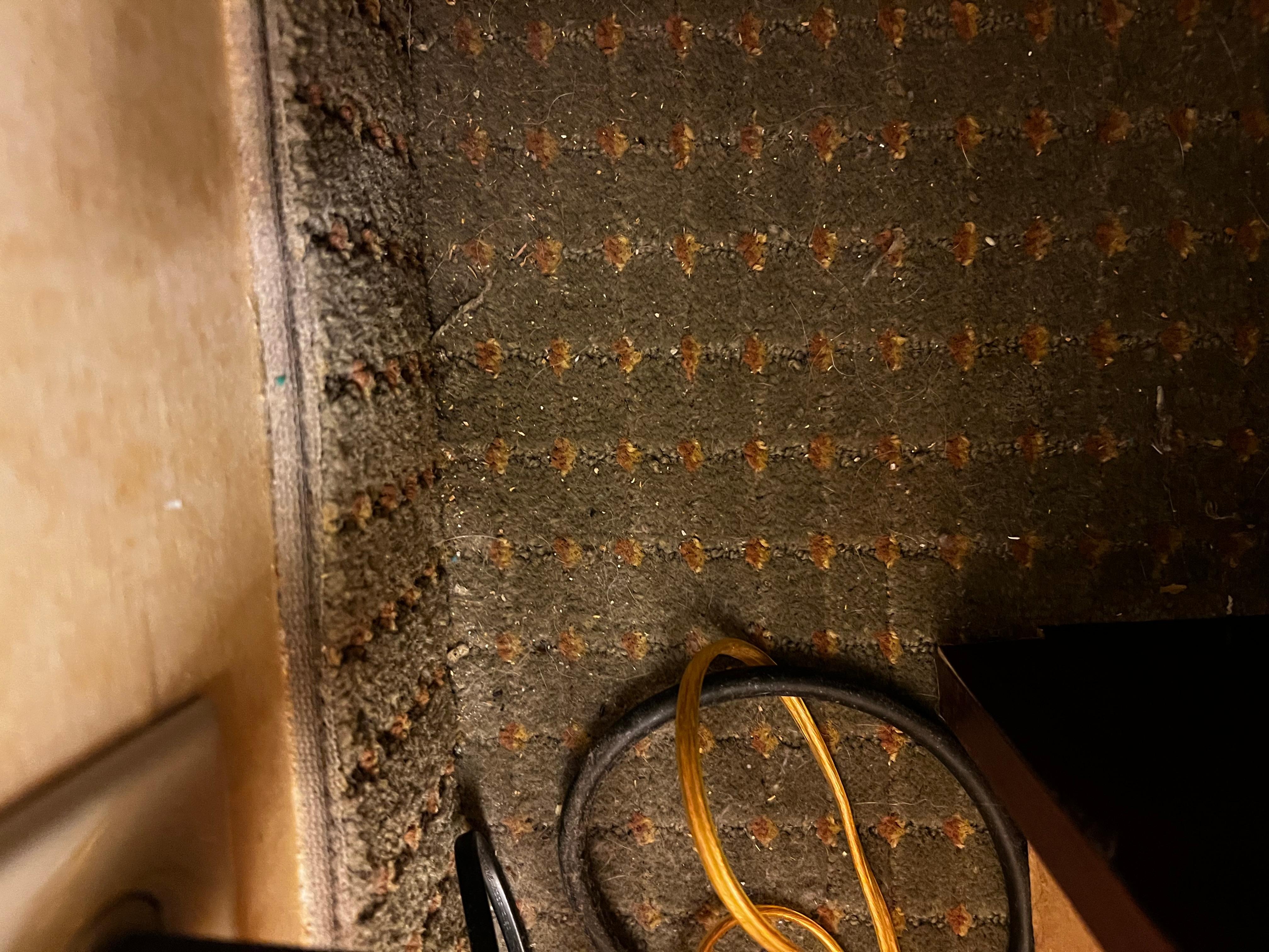 Dirt behind the night stand