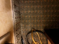 Dirt behind the night stand