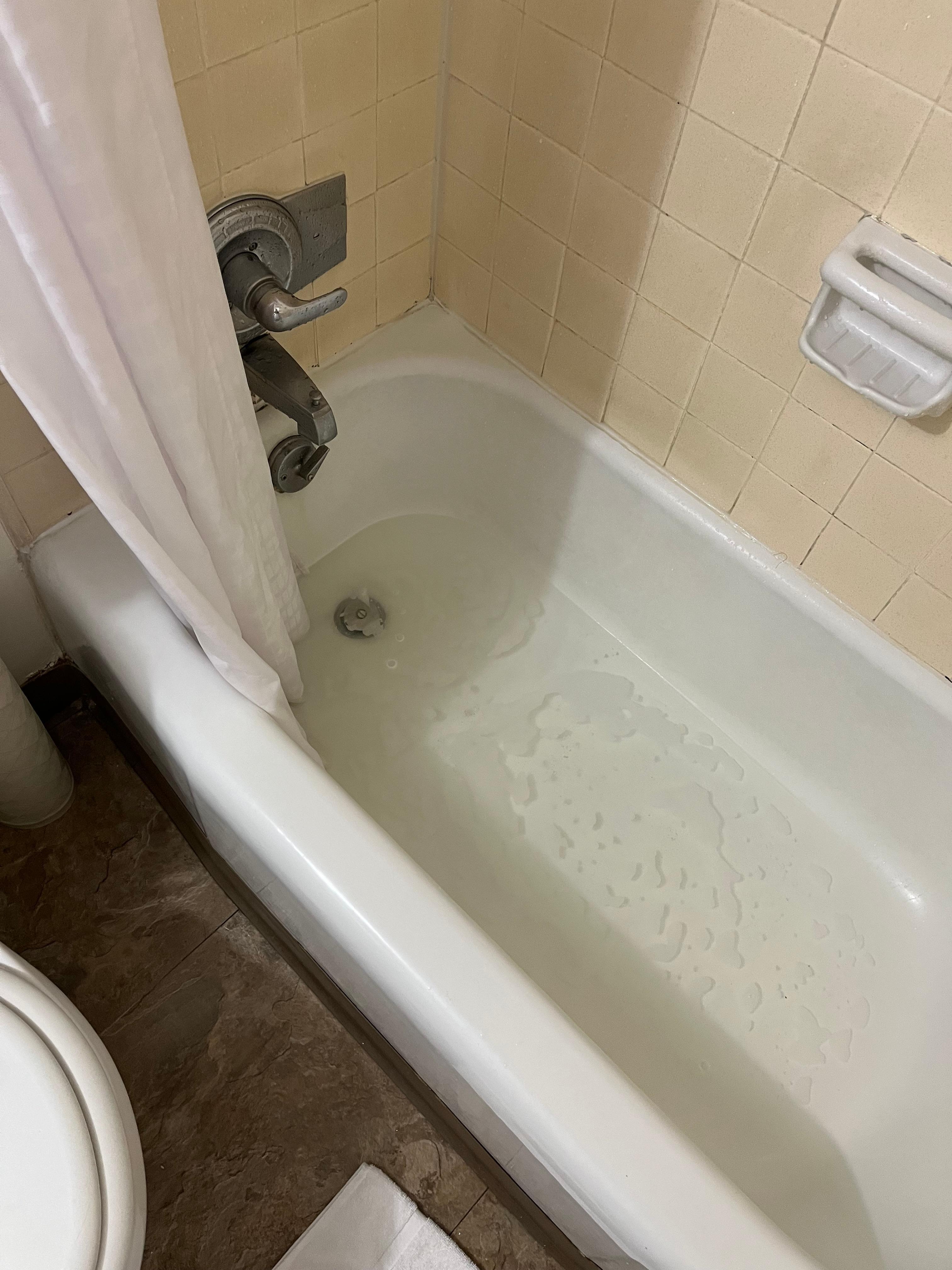 Backed up tub shower.