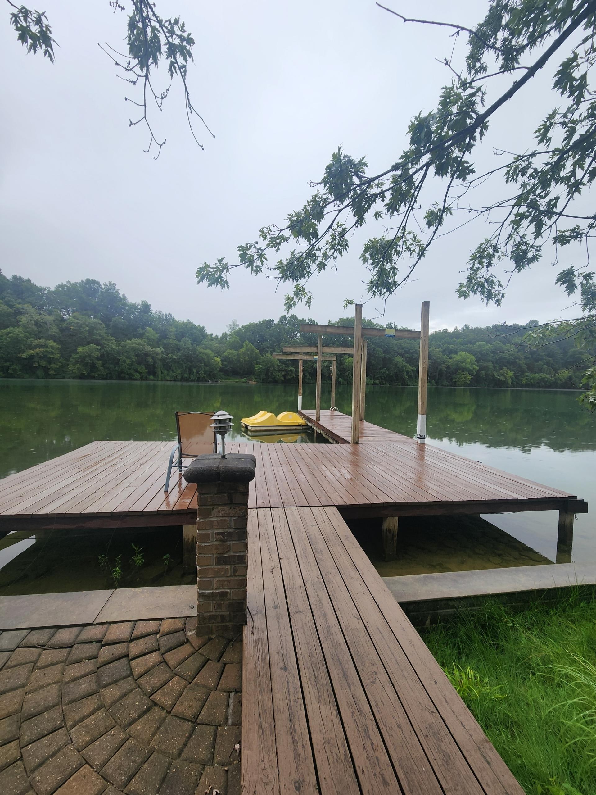 Fishing dock with paddle boat 