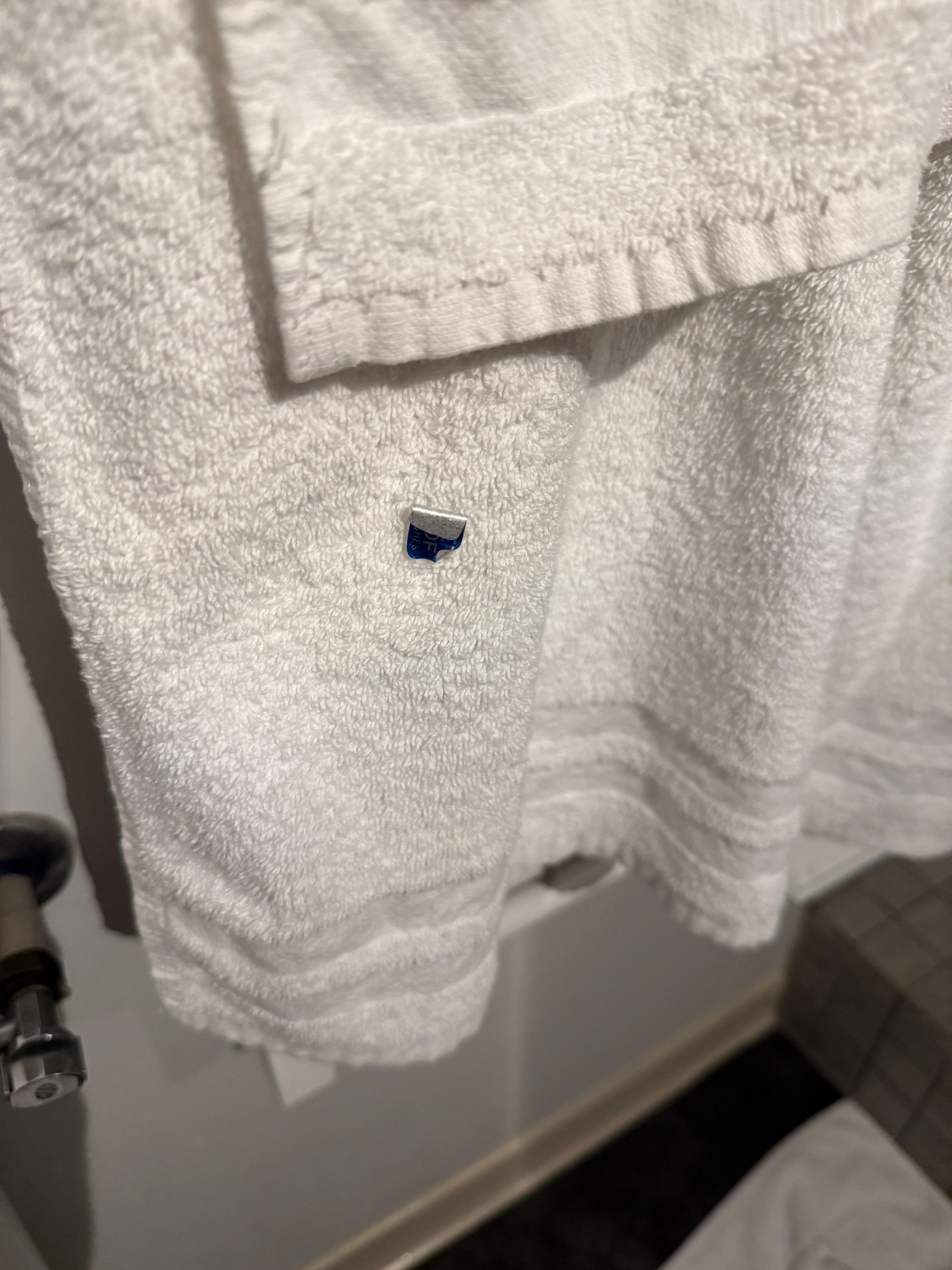 Random sticker on "clean" towel