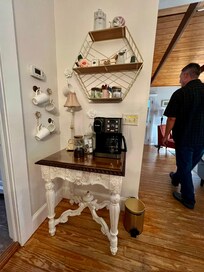 Stocked coffee bar with biscotti.