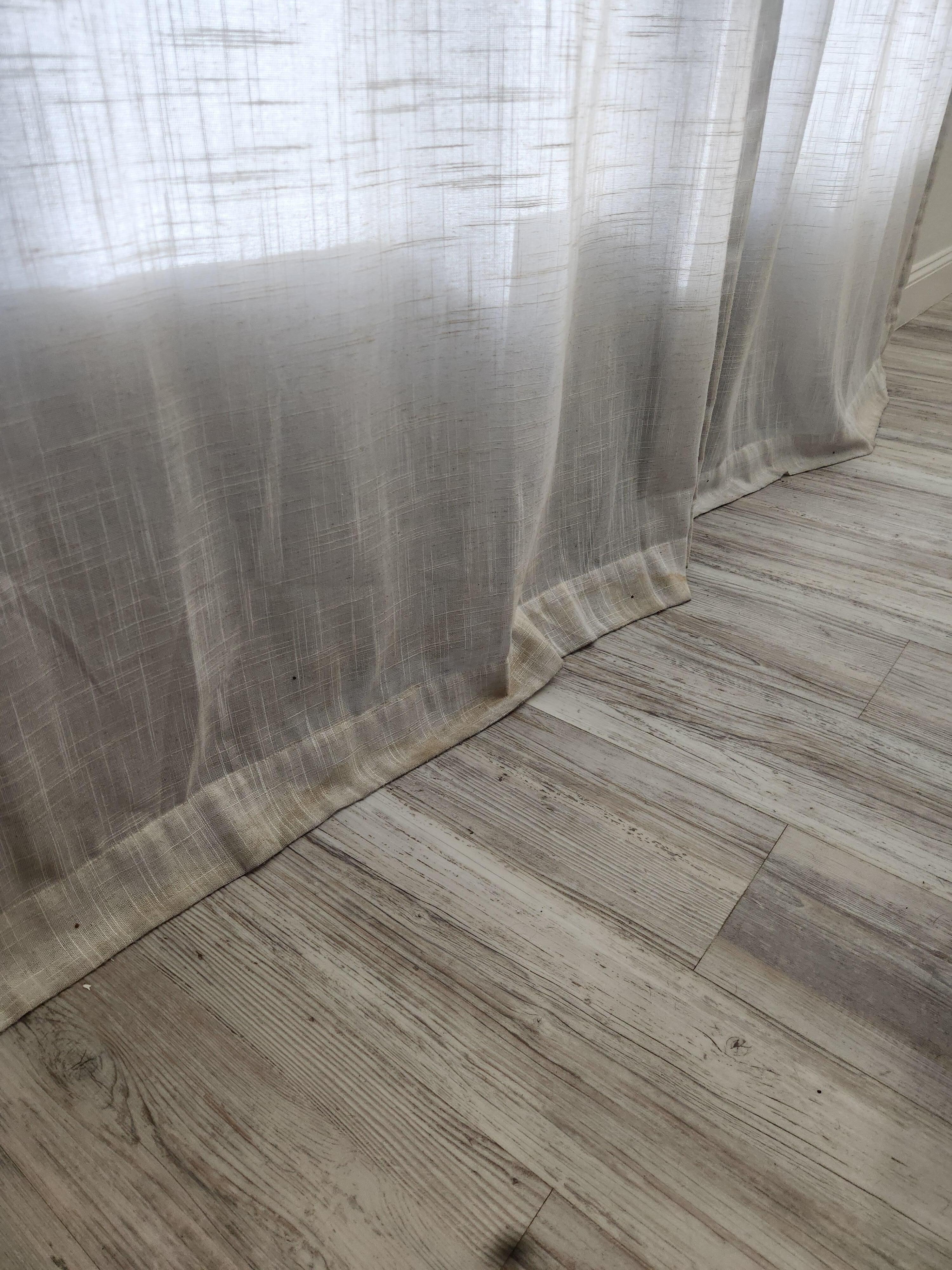 Dog piss stained curtains in EVERY room, on EVERY curtain.