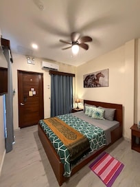 Clean, cool, and spacious room.