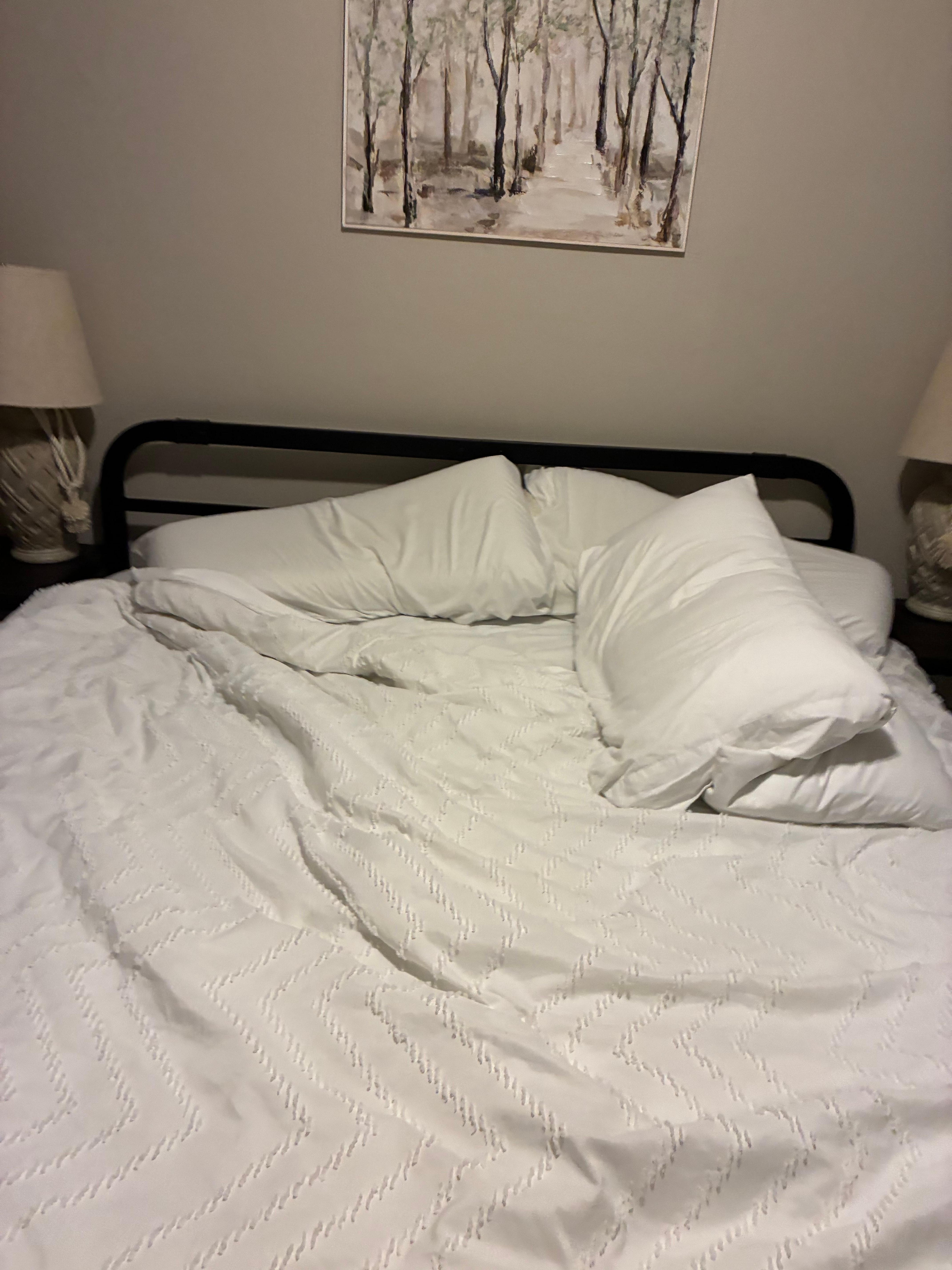 Unmade bed upon arrival