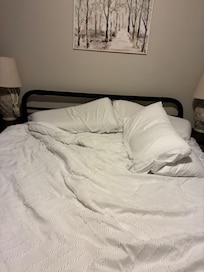Unmade bed upon arrival