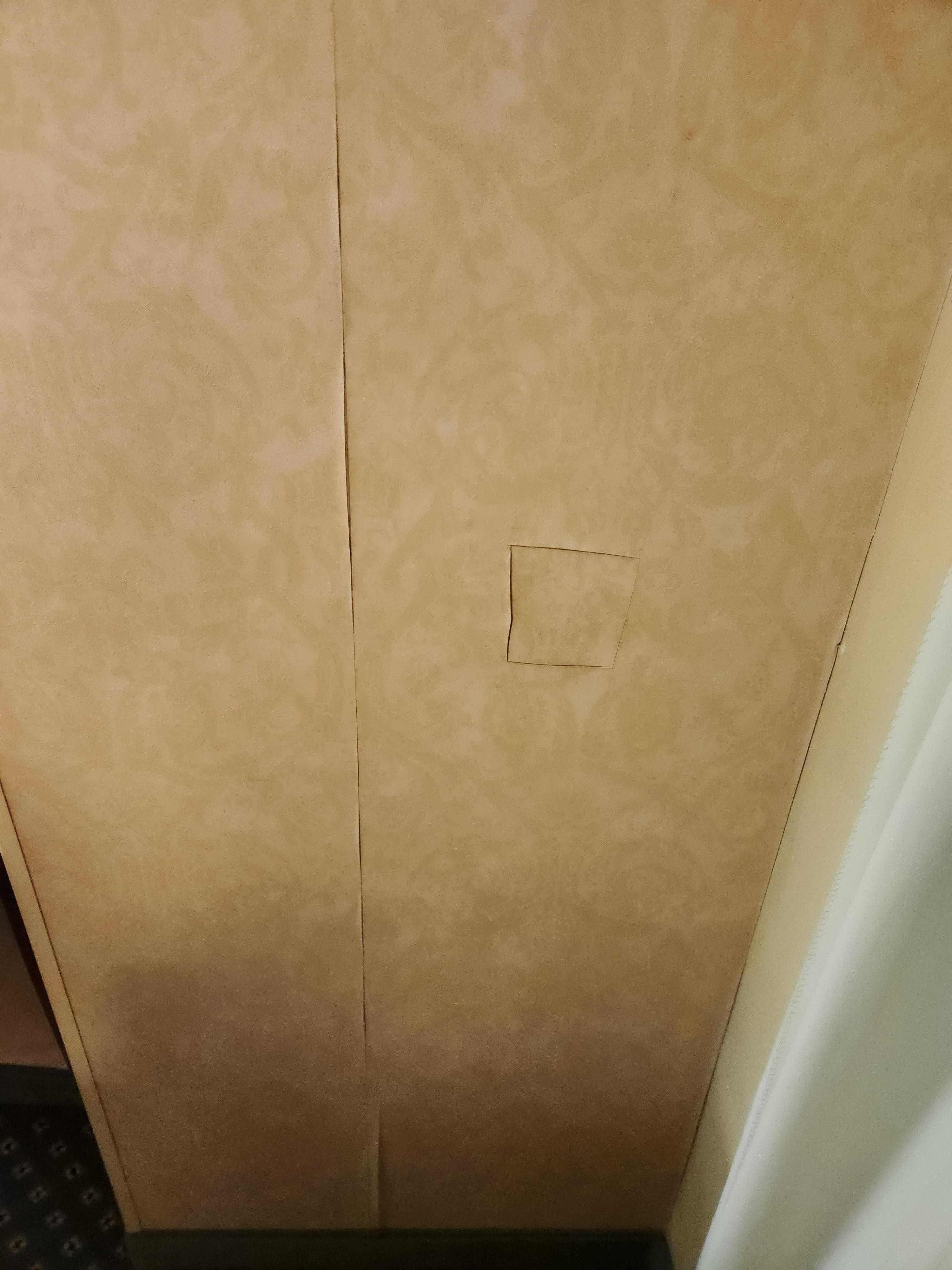 Wall paper is coming off.