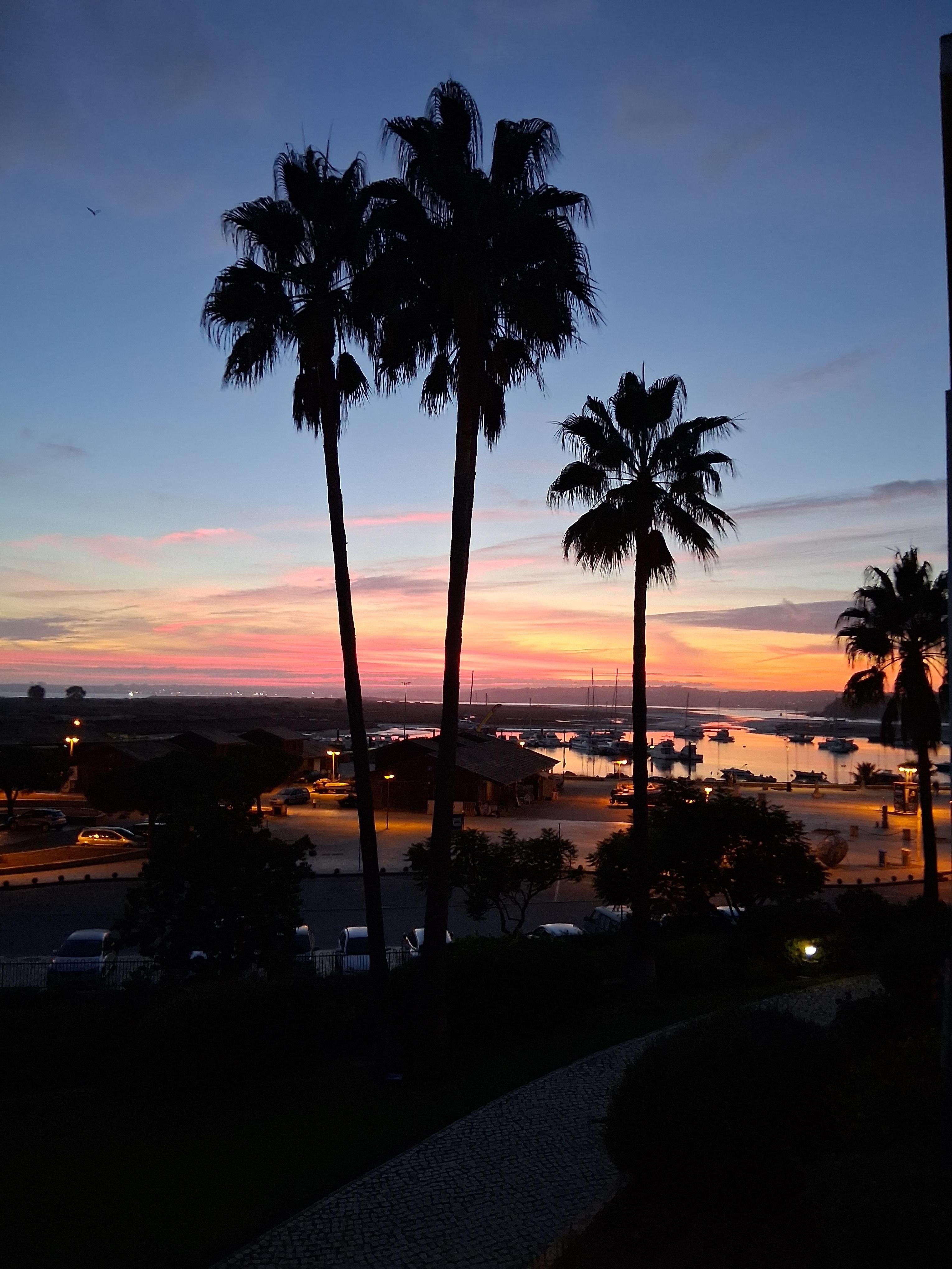 Sunset from the balcony overlooking the harbour in  Alvor.
