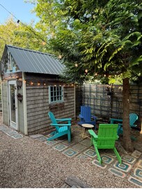 colorful chairs by shed