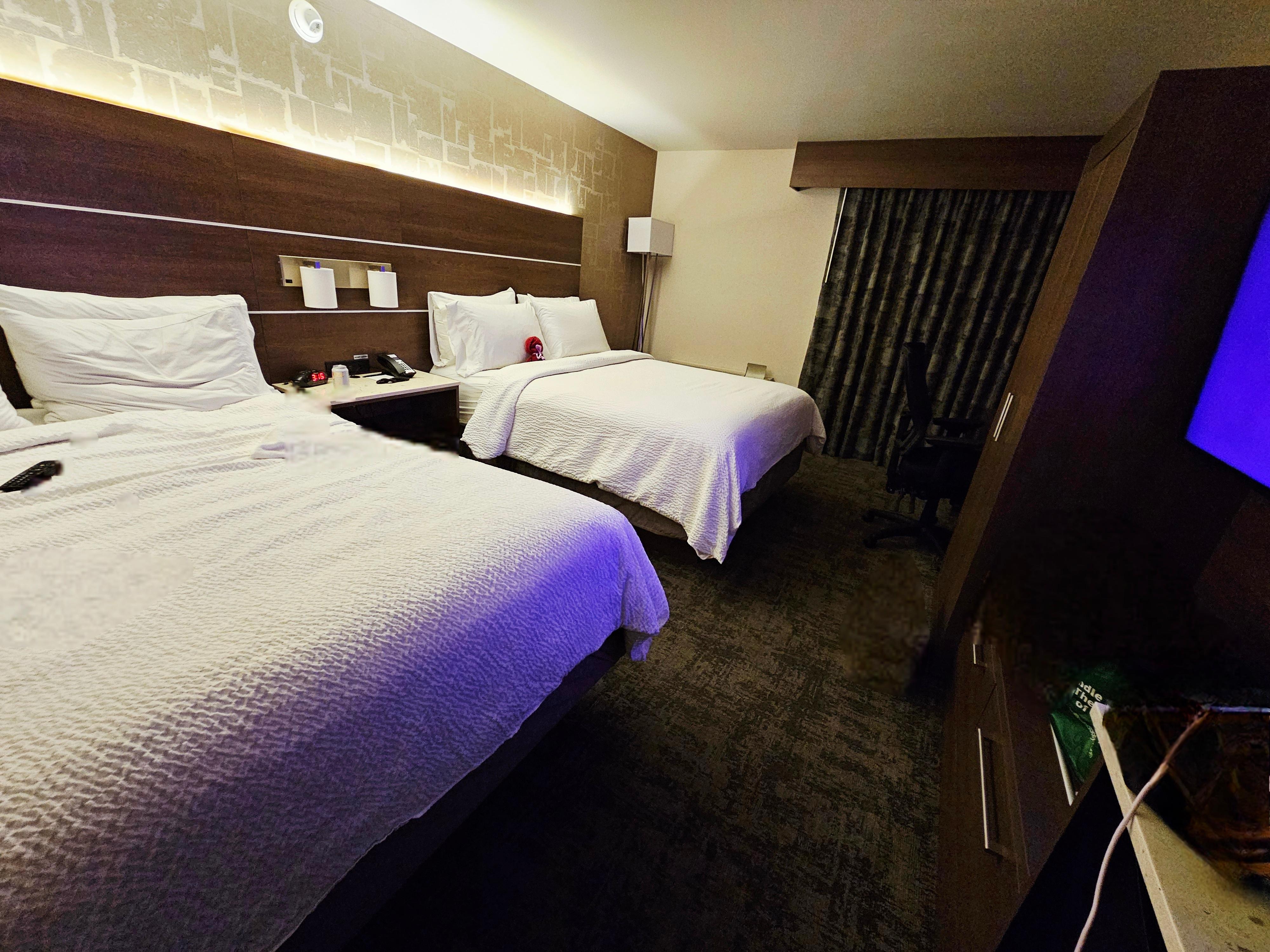 Room at night with varying ambient lighting and TV