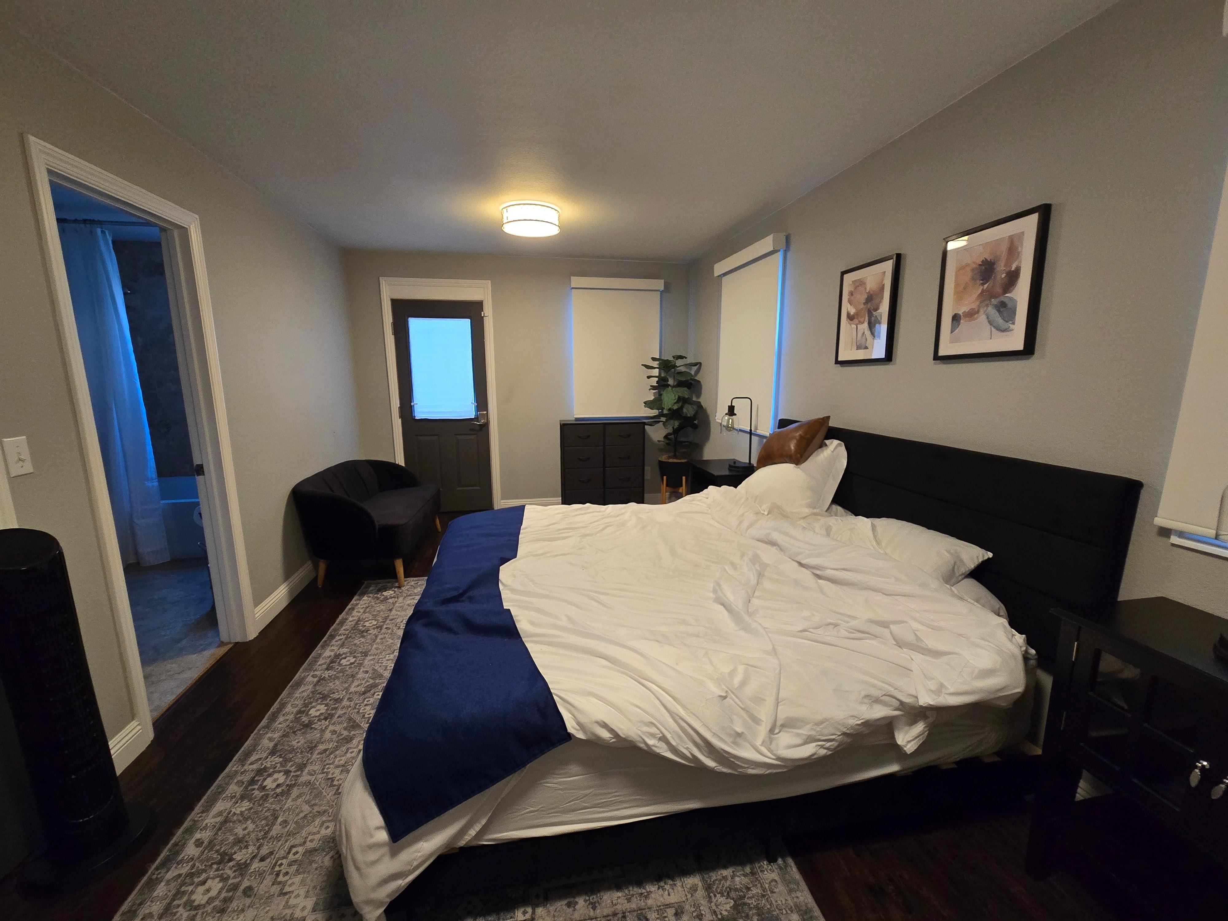 We messed up the bed a little before I remembered the photo. It's a king bed and the room has its own bathroom and balcony.