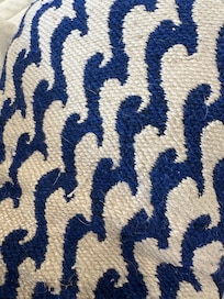 Dog fur on the pillow on the couch