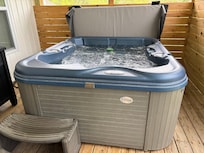 The hot tub had an easy top to remove and put back on