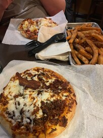 Pizza and fries at the Zebra sports bar and grille