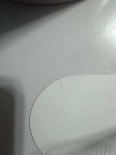 Pubic hair on drinking glass tray.
