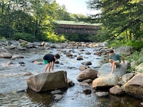 There is a steep (but easy) private stepped trail from the house to the river, which is shallow, rocky, and refreshing in the summer. The unique view of the Honeymoon Bridge makes this feel like New Hampshire!