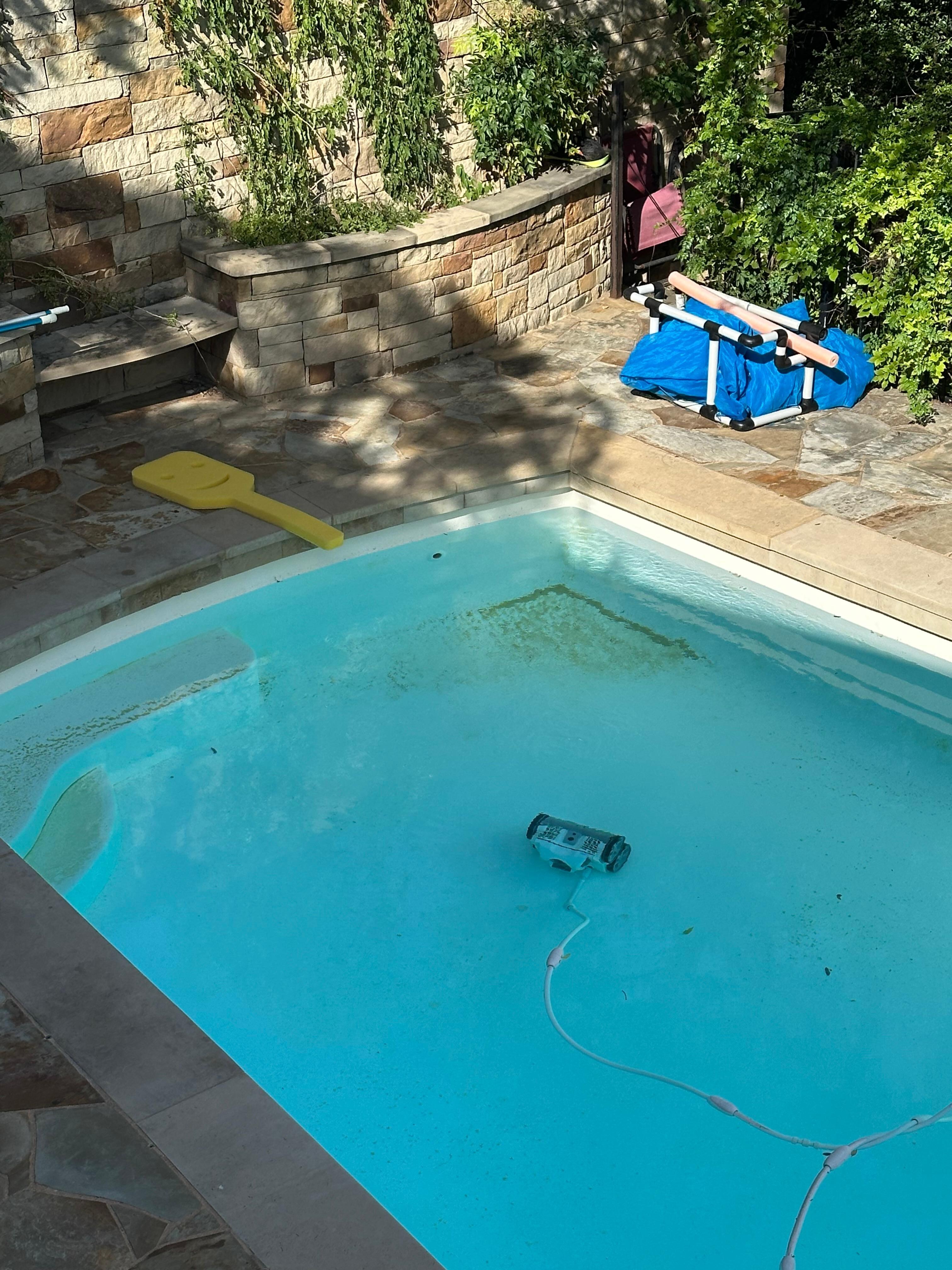 Sand in pool upon arrival.