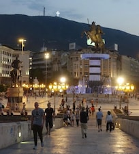 The Cross, the statue in the square, the stone bridge, and the old town bazaar on the same axis of Skopje