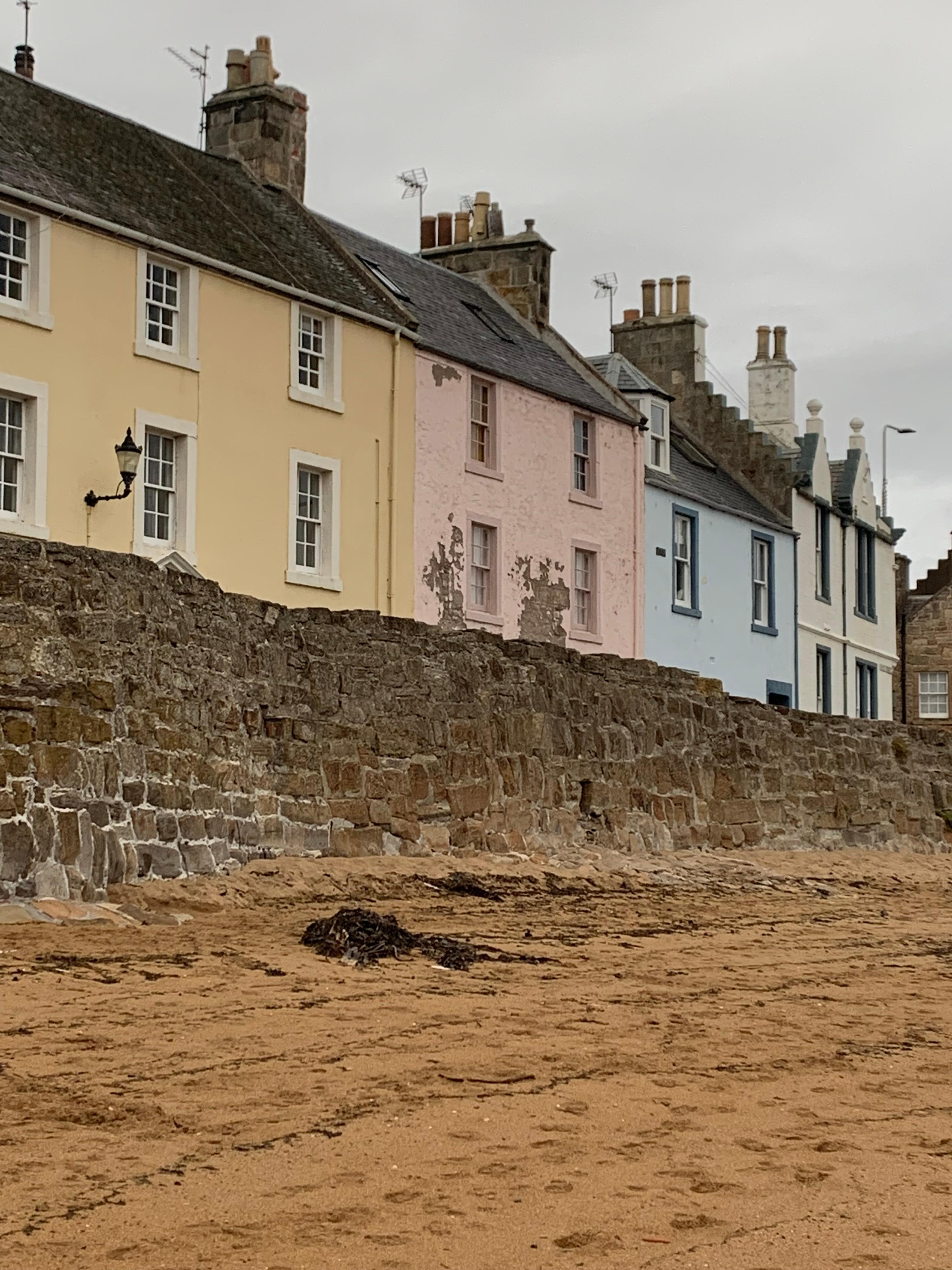 Yellow house is property No3 with sea wall
