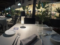 The restaurant outdoor patio dining is elegant.