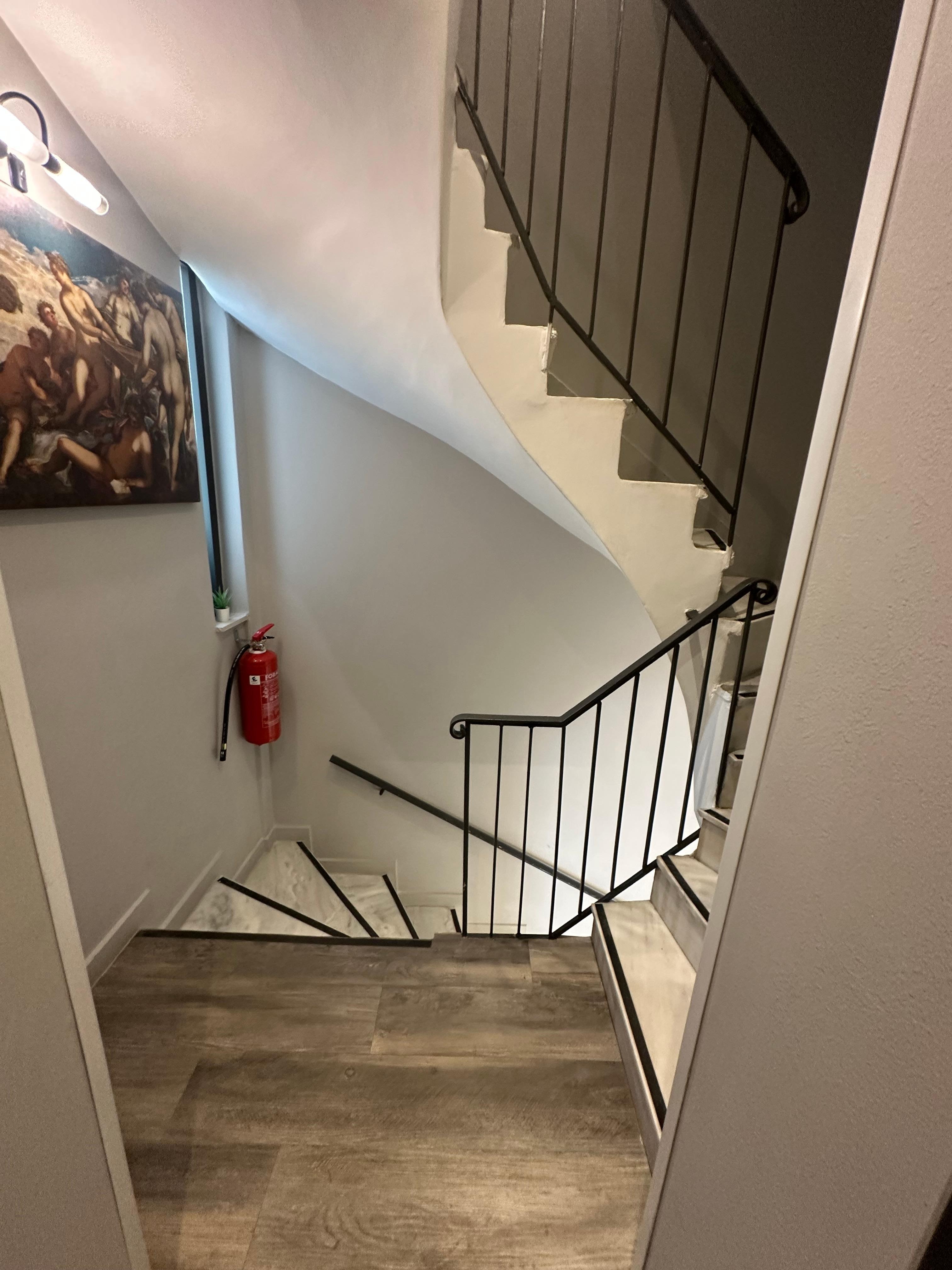 Winding stairway from bedroom