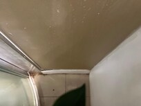 Water damage and mould in bathroom