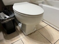 Caulk around toilet
