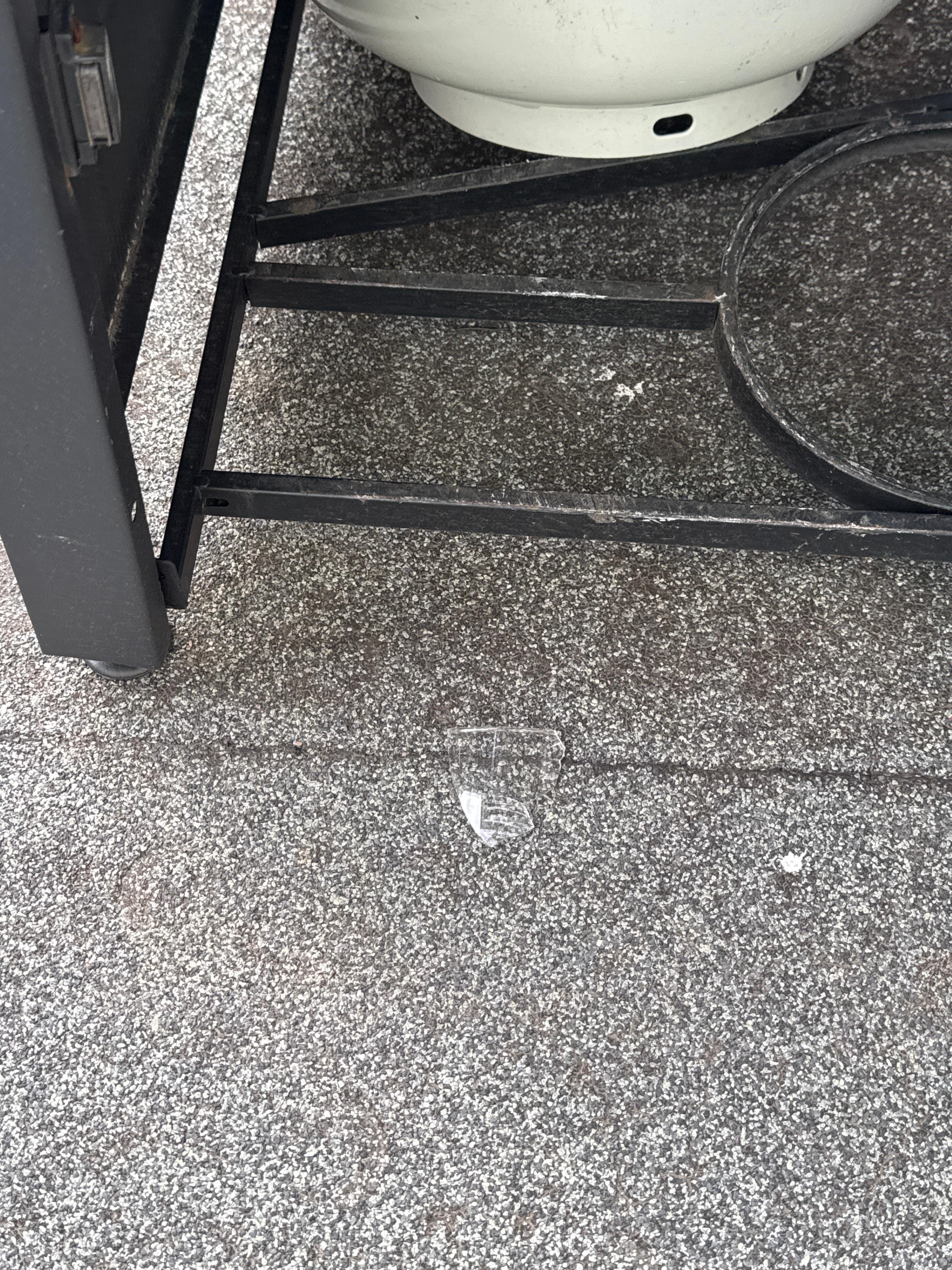 Glass under the fire pit which was also not in working order. Disappointing, no smores for us.