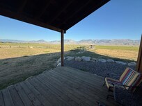 View from the back covered porch, facing West.