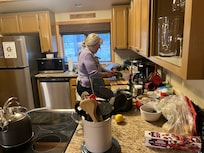 The little sister in the kitchen