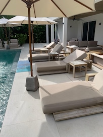 Comfortable seating by the pool.