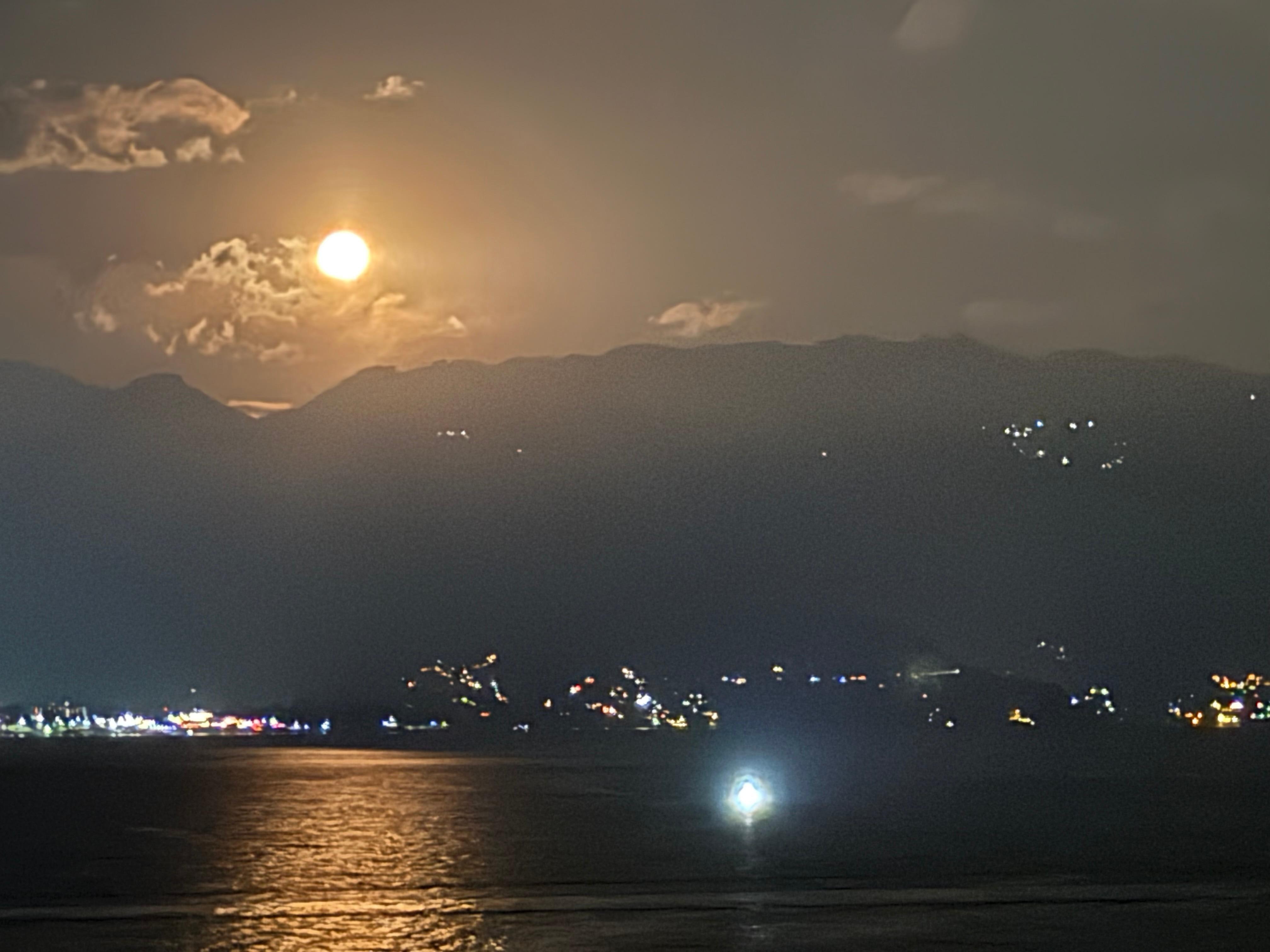 Full moon rising over the lake 
